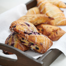 Load image into Gallery viewer, Wild blueberry and lemon scones on decorative tray
