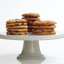 Load image into Gallery viewer, Stacks of chocolate chip, salted caramel and oatmeal raison cookies placed on decorative stand
