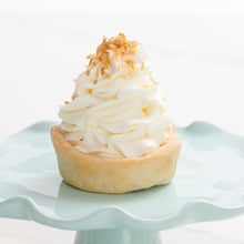Load image into Gallery viewer, Coconut cream mini cheesecake on decorative stand
