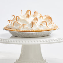 Load image into Gallery viewer, Lemon meringue pie placed on decorative stand

